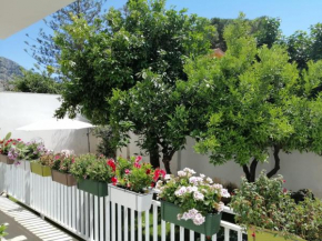 Mondello beach the house with green lawns